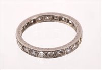 Lot 529 - Diamond eternity ring with a full band of...