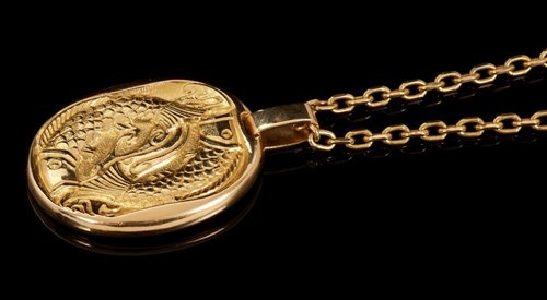 Lot 445 - Cartier 18ct gold Zodiac pendant necklace, the...