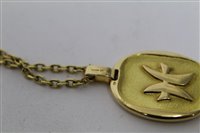 Lot 445 - Cartier 18ct gold Zodiac pendant necklace, the...