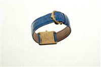 Lot 634 - Ladies' Must de Cartier gold plated tank...