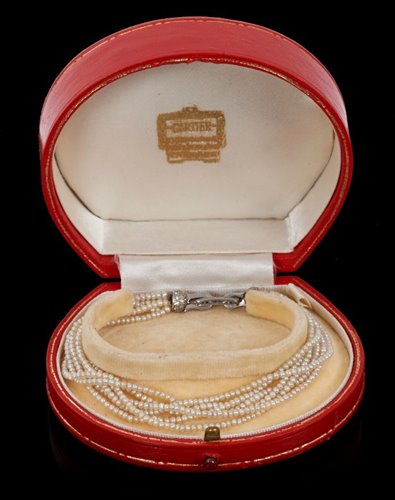 Lot 462 - Cartier diamond and pearl bracelet with six...