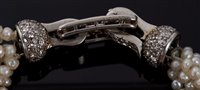 Lot 462 - Cartier diamond and pearl bracelet with six...