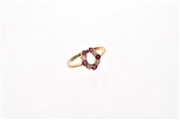 Lot 550 - Unusual ruby and diamond ring in the form of a...