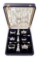 Lot 234 - A comprehensive 1930s silver condiment set -...