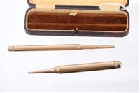 Lot 591 - Two 9ct gold propelling pencils <br /><br />