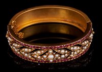 Lot 428 - Victorian ruby, diamond and pearl hinged...