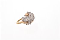 Lot 514 - Diamond cocktail ring with an abstract cluster...