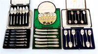 Lot 192 - Two cased sets of silver-handled tea knives,...