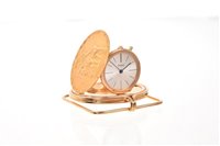 Lot 644 - Piaget 18ct gold watch and money clip, the...