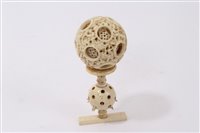 Lot 703 - 19th century Chinese ivory puzzle ball of...