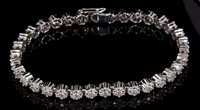 Lot 476 - Diamond bracelet composed of a line of diamond...