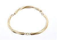 Lot 492 - Italian 18ct yellow gold bracelet with three...