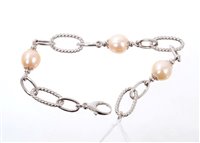 Lot 497 - 9ct white gold and cultured pearl bracelet....