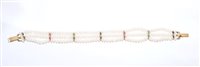 Lot 499 - Freshwater cultured pearl three-strand...