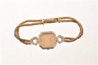 Lot 630 - Ladies' gold (18ct) and diamond set Baum &...