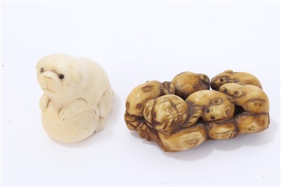 Lot 966 - Meiji period Japanese ivory netsuke in the form of a puppy