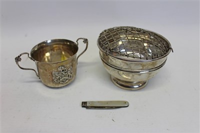 Lot 3509 - Late Victorian silver two-handled cup with arms for The
Worshipful Company of Grocers (London 1899), silver rose bowl and a silver
fruit knife (3)