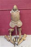 Lot 635 - Victorian 'theatrical' copy suit of armour comprising breast plate, helmet, gauntlets and vambrace