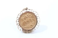 Lot 129 - G.B. gold Sovereign Victoria J.H. 1889.  F, in 9ct gold mount (total weight 10.3
grams) (1 coin)