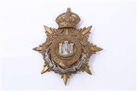 Lot 553 - Edwardian bi-metal The Devonshire Regiment Officers' helmet plate