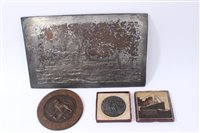 Lot 564 - Lusitania Medal in box of issue together with a Jutland Commerative Medal and a metal relief plaque of a Warship (3)