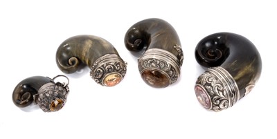 Lot 912 - Four 19th century Scottish silver snuff mulls with hardstone inset tops