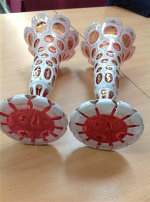 Lot 253 - Pair of mid-19th century Bohemian ruby and white overlaid glass vases, splayed foot, 27.5cm