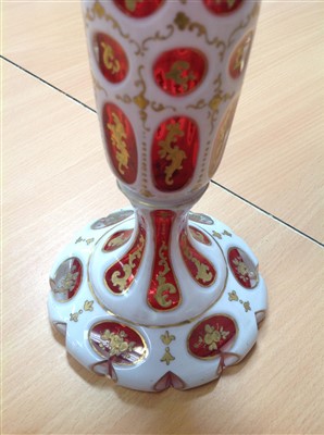 Lot 253 - Pair of mid-19th century Bohemian ruby and white overlaid glass vases, splayed foot, 27.5cm