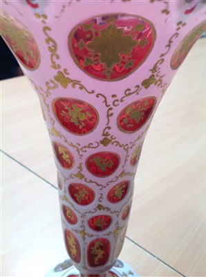 Lot 253 - Pair of mid-19th century Bohemian ruby and white overlaid glass vases, splayed foot, 27.5cm