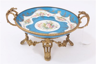 Lot 907 - Sèvres style porcelain and gilt metal mounted tazza