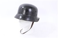 Lot 573 - Second World War Nazi Civil Defence Police / Fire Brigade helmet with tan leather liner