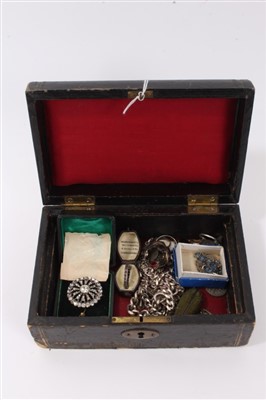 Lot 3239 - Victorian leather jewellery box containing silver and white metal jewellery