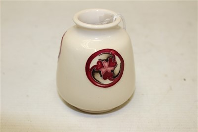 Lot 2010 - Moorcroft small vase with red floral roundel decoration on cream ground, 8cm
