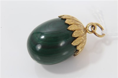 Lot 3247 - Malachite acorn pendant in yellow metal mount