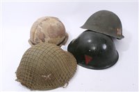 Lot 615 - Collection of Military Helmets to include three British MK IV steel helmets,  and an American steel helmet (4)