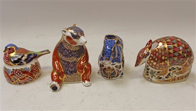 Lot 2031 - Four Royal Crown Derby paperweights – Nesting Chaffinch, Grey Squirrel, Honey Bear and Armadillo, all boxed