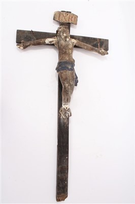 Lot 999 - Early carved and polychrome gesso figure of Christ