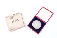 Lot 158 - G.B. Edward VII Silver Coronation medallion.  Crowned 9. August 1902.  UNC, diameter 64mm, in case of issue and with original Royal Mint envelope (1 medallion)