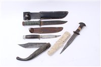 Lot 812 - American fighting knife with plastic grip and Bowie type blade, together with a old knife with wooden grip and steel blade by William Rogers, Sheffield, together with two other knives (4)