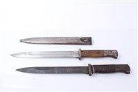 Lot 822 - First World War Imperial German M1884/98 II Bayonet in steel scabbard, together with a Second World War Nazi German Bayonet (lacking scabbard) (2)