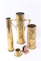 Lot 629 - First World War Trench Art Shell Case vase, decorated with Ivy leaves and dated 1915 on base, together with four other pieces of Trench Art (5)