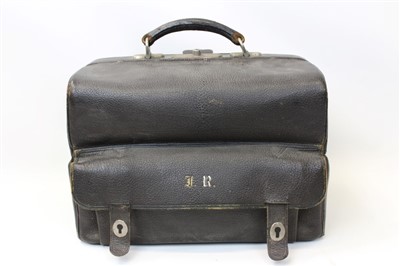 Lot 3064 - Finnigan's leather portmanteau with four silver top bottles