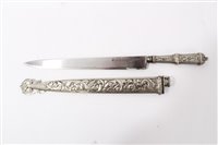 Lot 832 - South American Gaucho hunting knife with ornate white metal grip with foliate decoration and steel blade by Scholberg & Joucla Pelotas, Liege