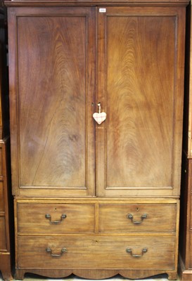 Lot 1428 - George III mahogany linen press