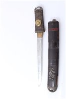 Lot 847 - Japanese Tanto dagger with ribbed wooden hilt, in black lacquer scabbard with white metal mounts, 26.5cm in overall length.