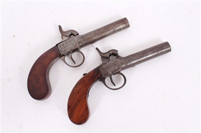 Lot 933 - Pair of 19th Century percussion box lock pocket pistols with turn off barrels and Birmingham proofs with walnut slab sided butts