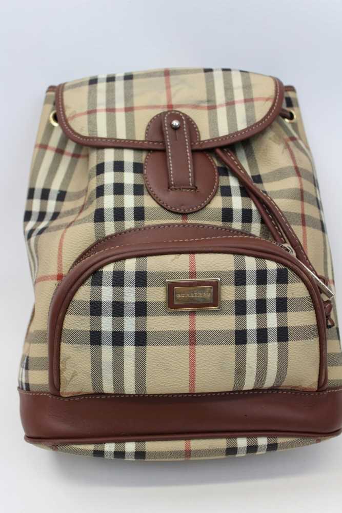 Lot 3093 - Burberry check leather rucksack