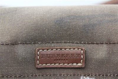 Lot 3093 - Burberry check leather rucksack