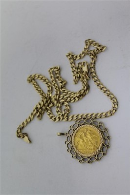 Lot 3353 - Queen Elizabeth II gold sovereign in 9ct gold pendant mount on 14ct gold flat curb link chain