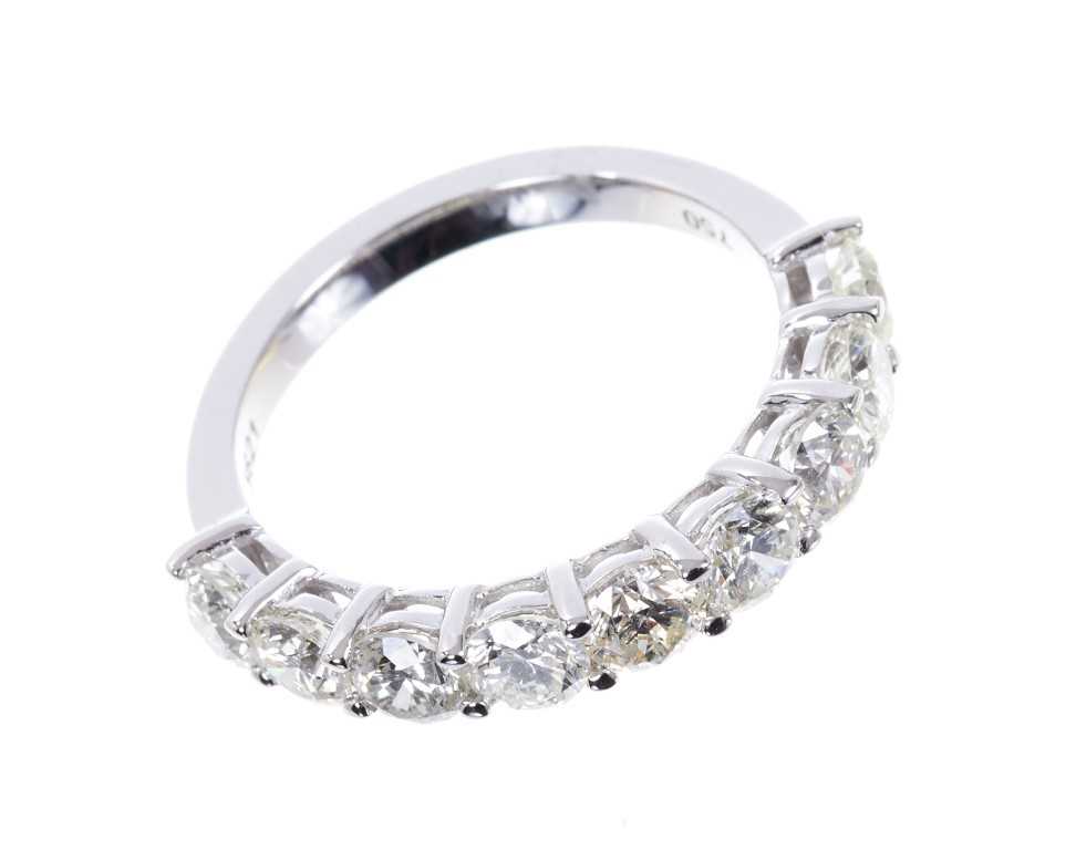 Lot 664 - Diamond half eternity ring, 1.93cts